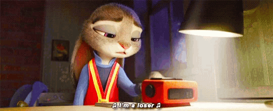 a cartoon rabbit says i 'm a loser while looking at an alarm clock