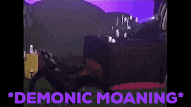 a video of a man laying on a bed with the words " demon night meanings " written on the bottom