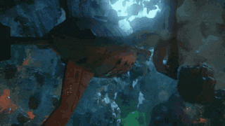 a coral reef in the ocean with a fish swimming in the background