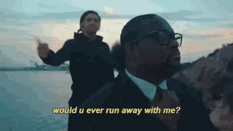 a man in a suit and tie is asking another man if he would ever run away with him ..
