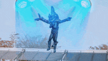 a blurred image of a person in a blue suit