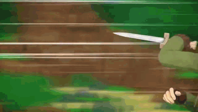 a video game character with blue hair is holding a knife in his hand .