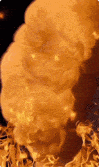 a close up of a fire explosion with smoke coming out of it on a black background .