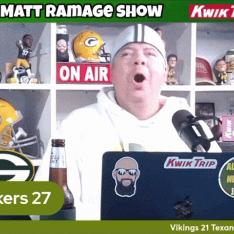 a man speaking into a microphone with the words matt ramage show behind him