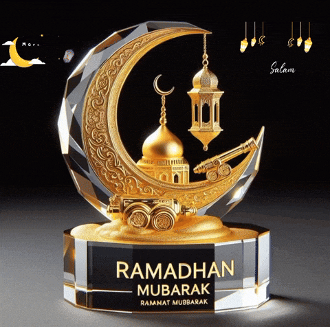 a glass statue of a crescent moon with the words ramadhan mubarak written on it