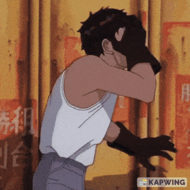 a man in a white tank top covering his face with his hands and the word kapwing on the bottom right