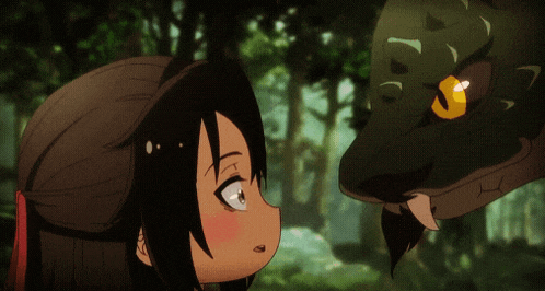 a little girl looks at a snake with a yellow eye