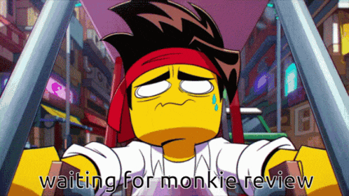 a cartoon of a man sitting in a chair with the caption waiting for monkie review