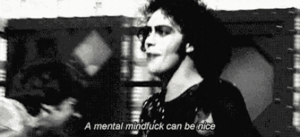 a black and white photo of a man with a mental mindfuck can be nice .