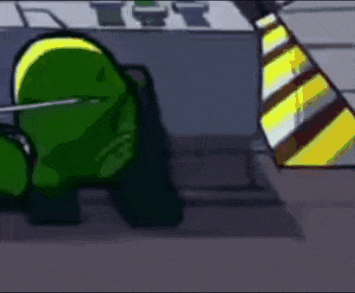 a green among us character is laying on the ground with a sword .