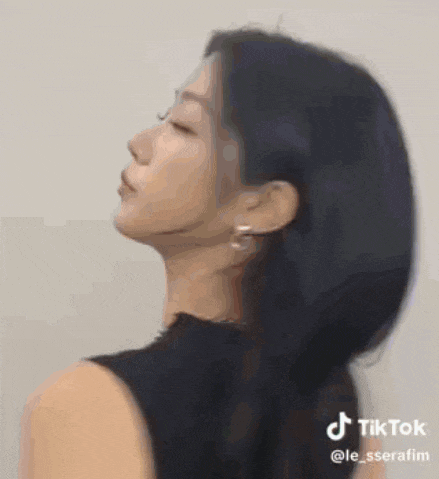 a woman 's face is shown in a tik tok video