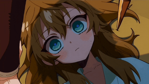 a close up of a girl 's face with a blue eye