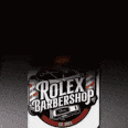 a can of rolex barbershop sitting on a table .