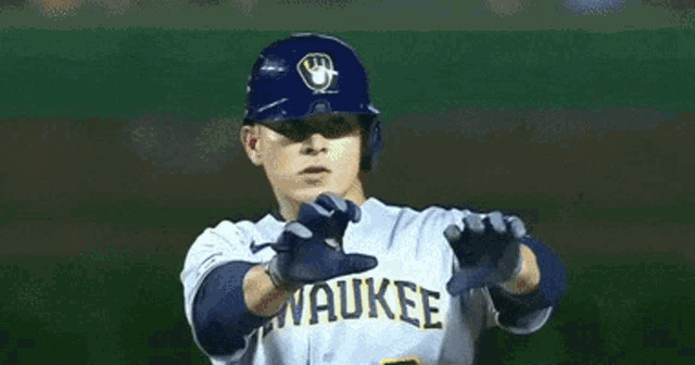 a baseball player is wearing a walkee jersey and a cubs jersey