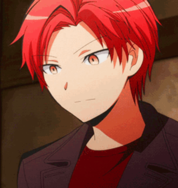 a boy with red hair is wearing a purple jacket