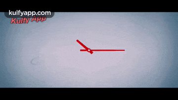 a picture of a clock with the words kulfyapp.com in the upper right corner