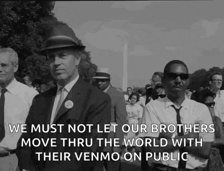 a black and white photo of a group of men walking down a street with a quote .