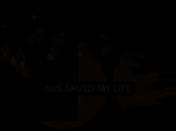 a cartoon of a man holding a chain with the words " kiis saved my life " below it