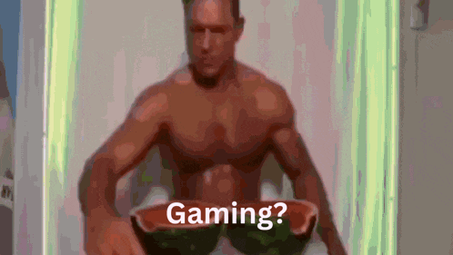 a shirtless man is holding a bowl of watermelon and says gaming ?