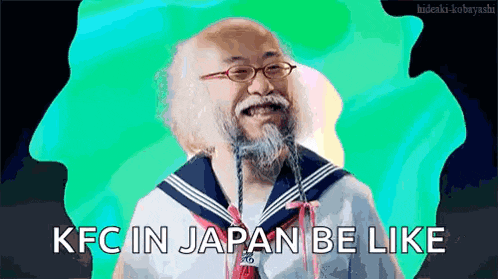 a man with a beard and glasses is wearing a sailor suit and says kfc in japan be like