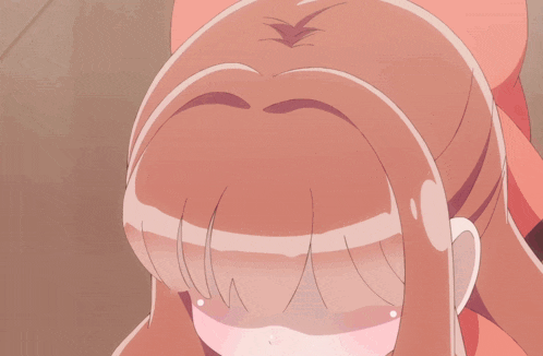 a close up of a girl 's face with sparkles surrounding her