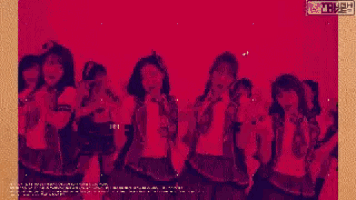 a group of girls are standing next to each other in a pixelated image