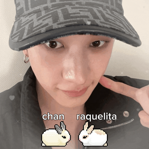 a woman wearing a hat has chan and raquelita written next to her