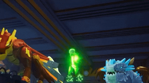 a lego ninjago character is glowing in the dark with green lights coming out of his chest .