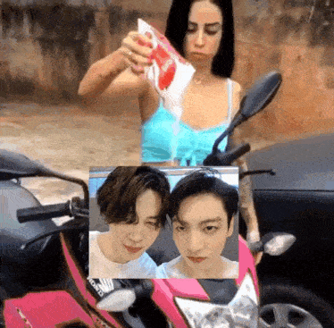 a woman is holding a bag of chips next to a pink honda motorcycle