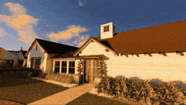 a house with a brown roof has a chimney on top of it