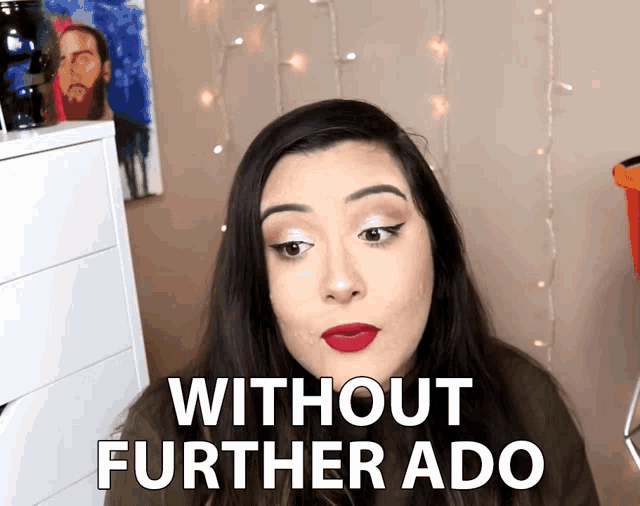 a woman says without further ado in front of a dresser