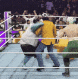 a man in a yellow jacket is fighting another man