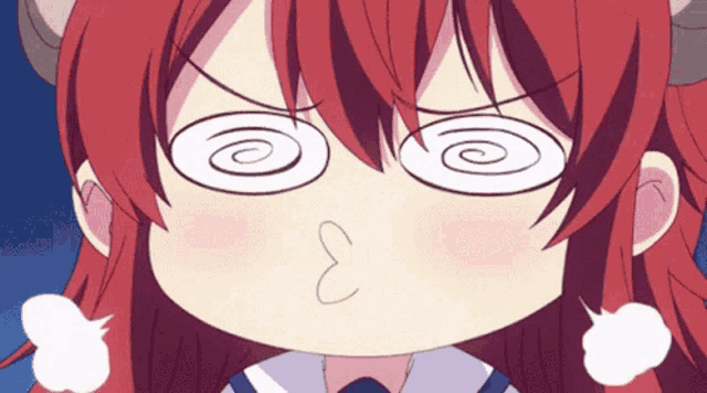 a close up of a girl 's face with a swirling eye and the letter e on her nose