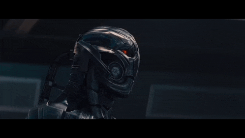 a robot with a red light behind it
