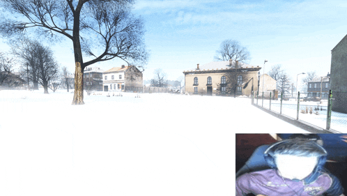 a man wearing headphones looks at a snowy scene