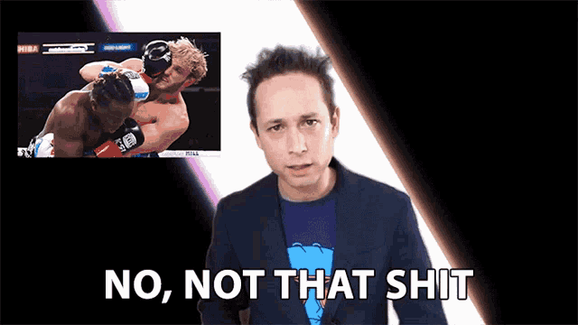 a man in a suit and blue shirt says no not that shit