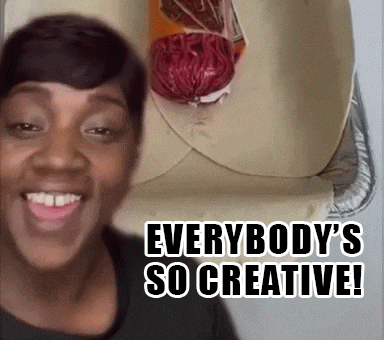 a woman is smiling with the words " everybody 's so creative " behind her