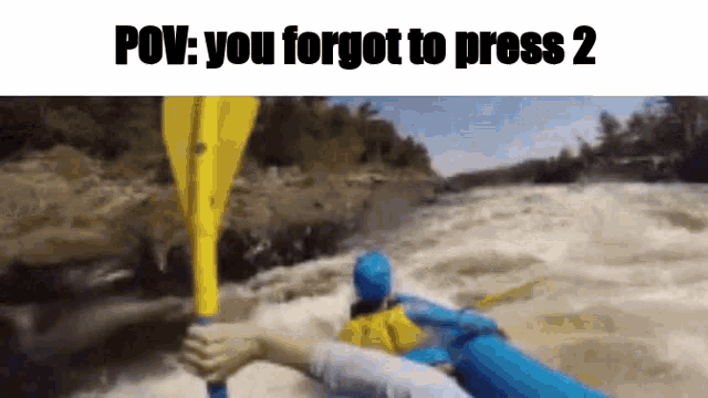 a person in a blue raft is holding a yellow paddle in the water .