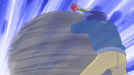 a man in a blue jacket is pushing a large rock while holding a baseball bat .