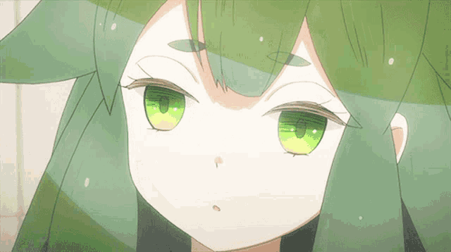 a close up of a girl with green hair