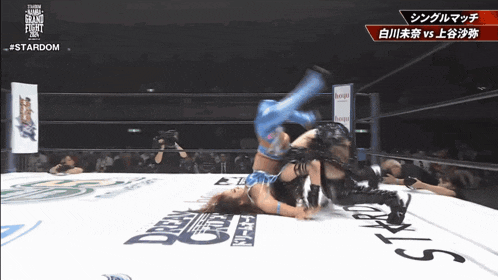 two women are wrestling in a ring with the hashtag #stardom