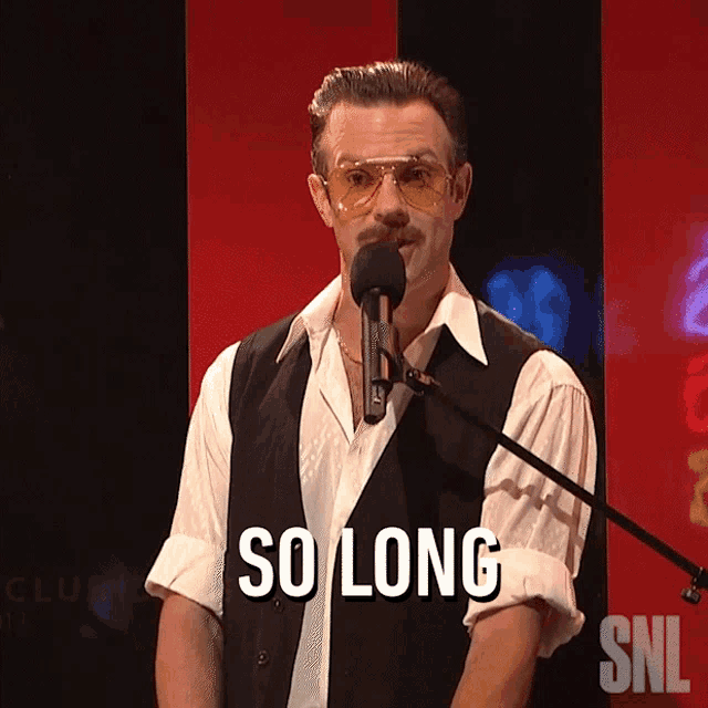 a man singing into a microphone with the words so long written below him