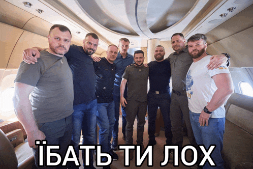 a group of men are posing for a picture with a caption that says " ibatb ti lox "