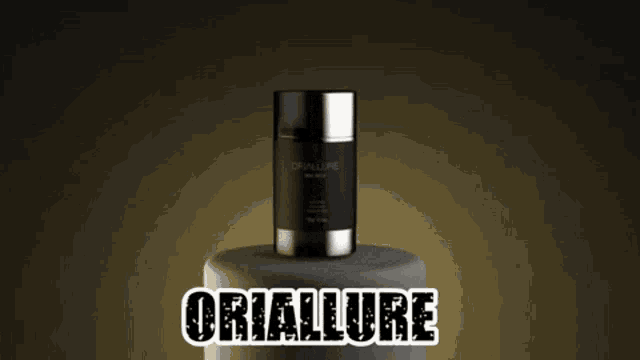 a bottle of oriallure sits on top of a pedestal