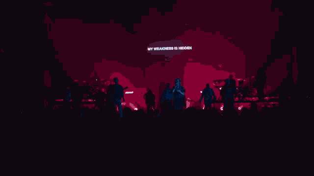 a group of people on a stage with a sign that says " within your glory "