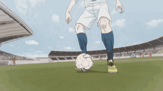 a soccer player is kicking a ball in a stadium with a motul ad on the side