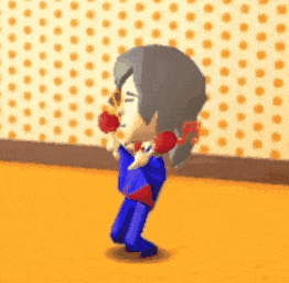 a cartoon character is standing in front of a wall with polka dots and holding a red object .