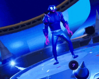 a man in a superhero costume is dancing on a stage in front of a blue background with the number 7 in the corner