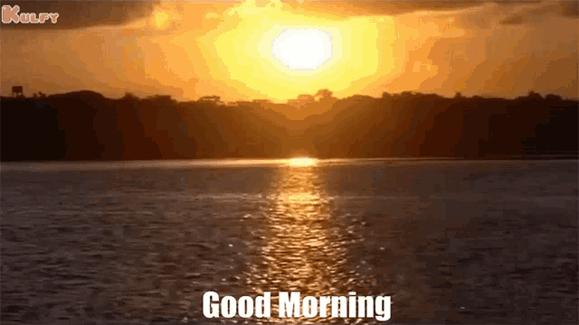 a sunset over a body of water with the words good morning written on it