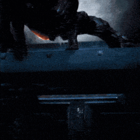 a person is crawling on a metal surface with a dark background